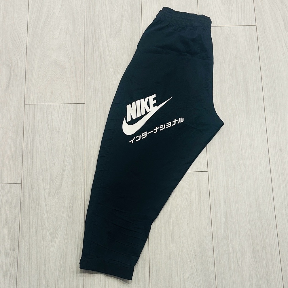 Nike Black Jogger Bottoms with White Logo